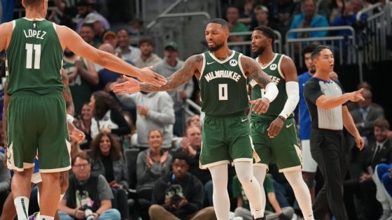 Damian Lillard debuts with 39 points, closes out Bucks' win