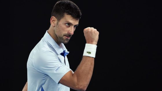 Djokovic rolls to Aussie quarters, matches Federer's Slam record