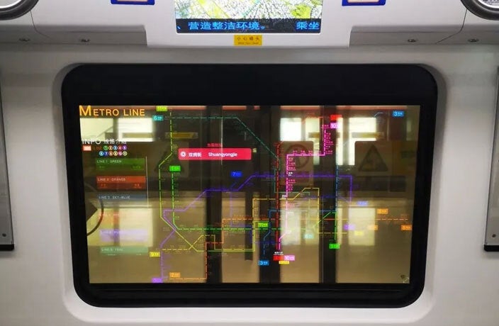 A transparent screen in a subway train in Shenzhen, China - Phone with transparent screen: is it possible?