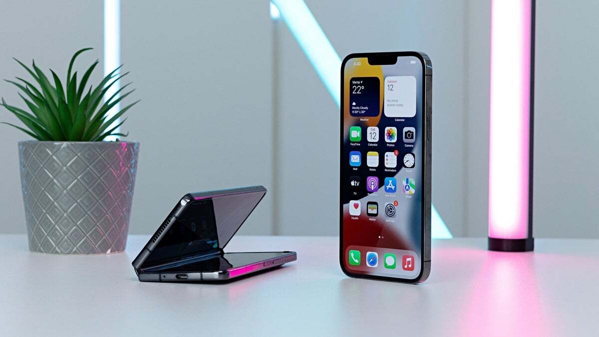 A Samsung Galaxy Z Flip next to an iPhone - New leak got me thinking about Apple's foldable iPhone-iPad hybrid I've always wanted, and we'll never get