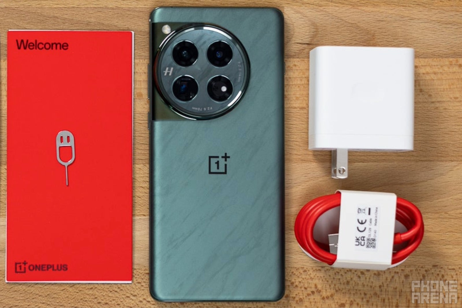 The latest OnePlus 12 has a charger in the box (Image credit – PhoneArena) – Wait, does Ikea sell Apple and Samsung's expensive power adapters?